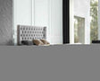 Waterloo king bed in plush grey velvet with a tufted headboard and end board in a modern bedroom