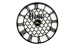 Arabella black quatrefoil 80cm statement wall clock on a feature wall
