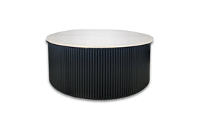 Kinglake white marble black base coffee table in a modern living room