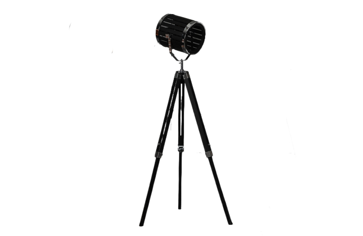 Industrial tripod floor lamp with matte black adjustable spotlight head