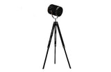 Industrial tripod floor lamp with matte black adjustable spotlight head