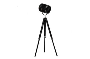 Industrial tripod floor lamp with matte black adjustable spotlight head