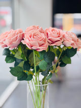 Soft pink artificial rose stem close-up showing lifelike petal and leaf detail — Allure Home Collections