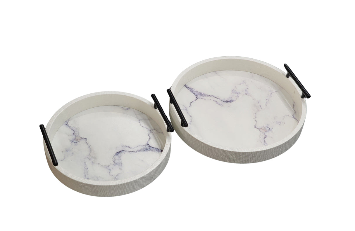 Pair of white faux marble round trays with black handles