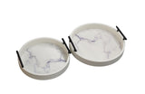 Pair of white faux marble round trays with black handles