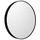 Fairhaven black round metal wall mirror in a contemporary living room