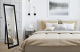 Moggs Creek black ornate French provincial free standing floor mirror in an elegant bedroom