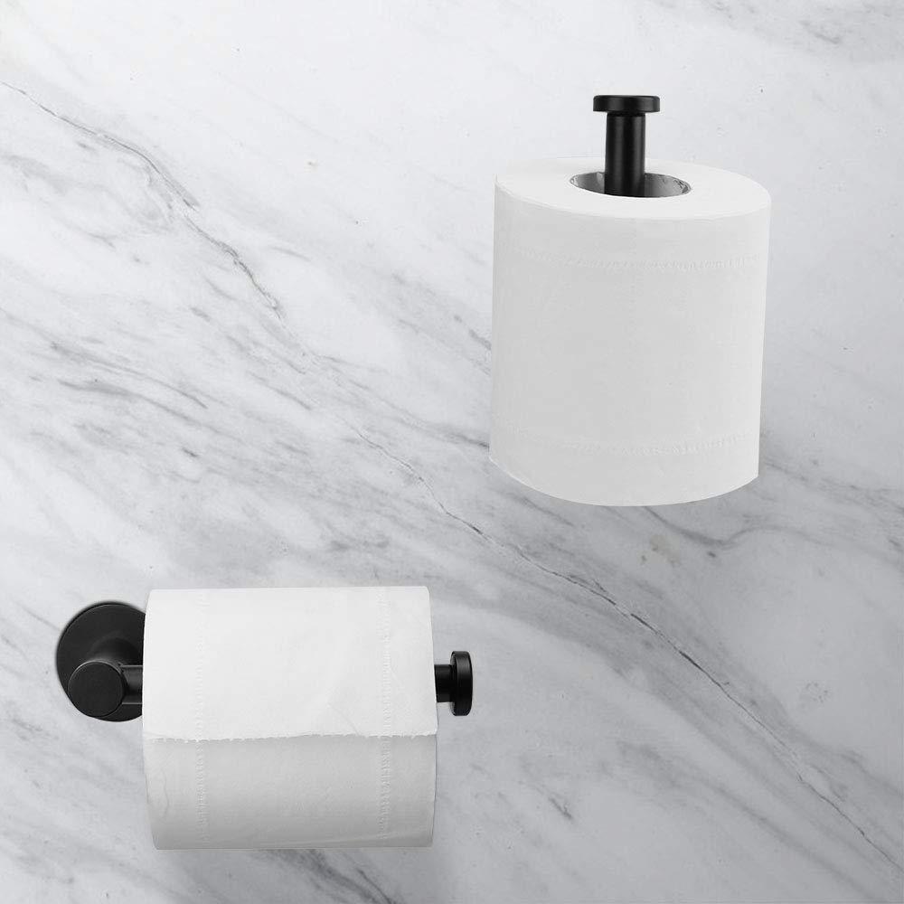 Black roll holder shown beside a toilet in a compact bathroom