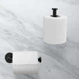 Black roll holder shown beside a toilet in a compact bathroom