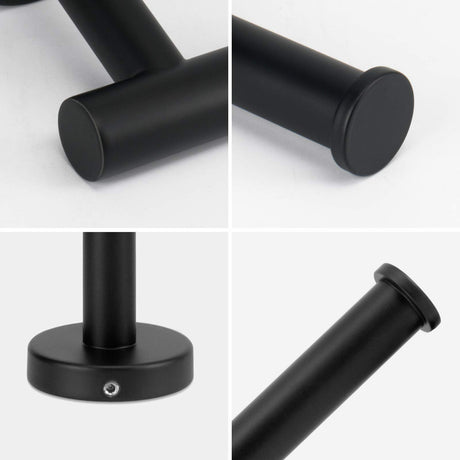 Toilet roll sliding onto the open arm of the black roll holder