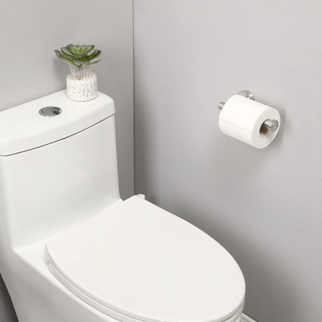 Toilet roll sliding onto the open arm of the brushed silver holder