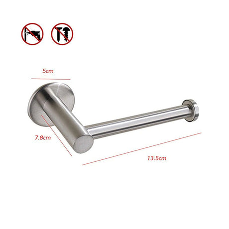 Brushed silver toilet roll holder mounted on a tiled bathroom wall