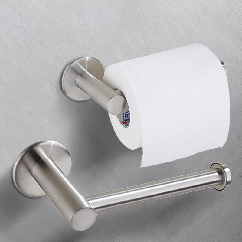 Adhesive mounting plate on the back of the toilet paper holder