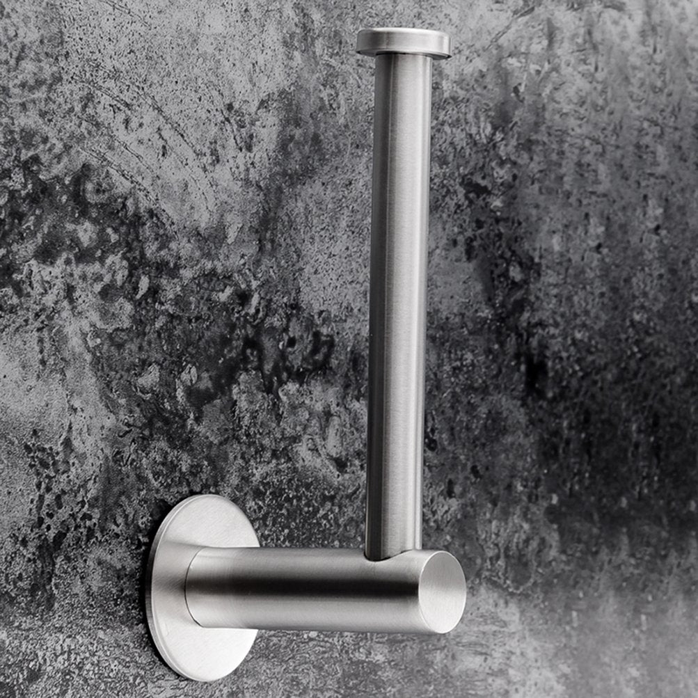 Toilet roll loaded onto the brushed silver adhesive paper holder