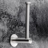 Toilet roll loaded onto the brushed silver adhesive paper holder