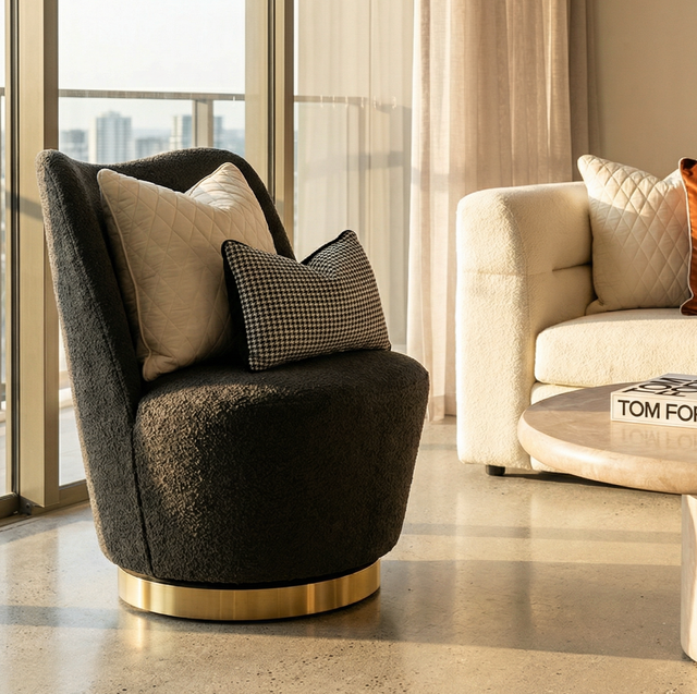 Pulpit charcoal boucle swivel armchair in a modern living room