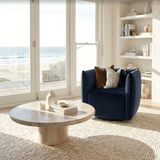 Kanangra indigo velvet swivel armchair in a modern living room