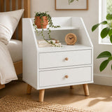 Rosebank warm white two drawer bedside table with wooden legs in a Nordic bedroom