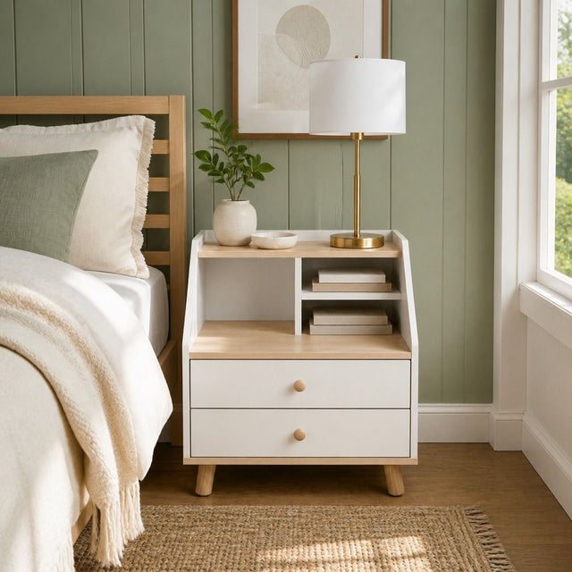 Rosebank white and wood two drawer bedside table with wooden legs in a Nordic bedroom