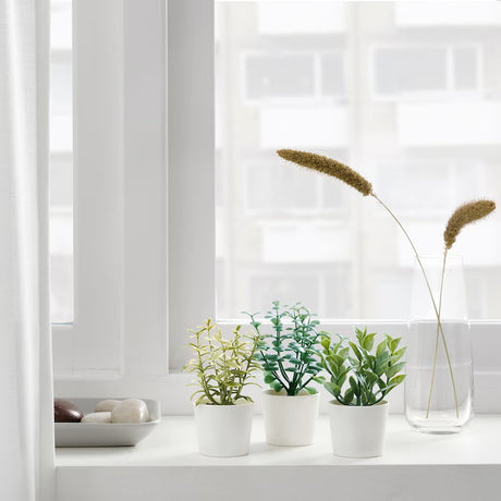 Three artificial herb plants styled on kitchen shelf — Allure Home Collections