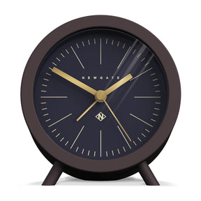 Hugo chocolate black mid century alarm clock with petrol blue dial on a nightstand