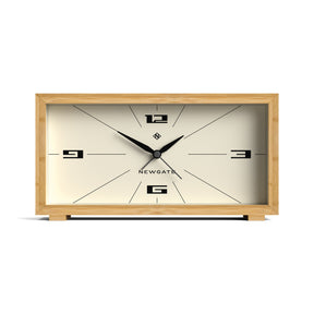 Elodie bamboo alarm clock with cream retro dial on a bedroom shelf