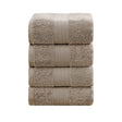 Set of four sandstone 550 GSM ring spun cotton bath towels folded and stacked