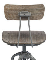 Industrial grey swivel bar stool in contemporary kitchen setting — Allure Home Collections