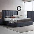 Edgecliff queen gas lift bed with a clean upholstered headboard and hidden storage in a bedroom