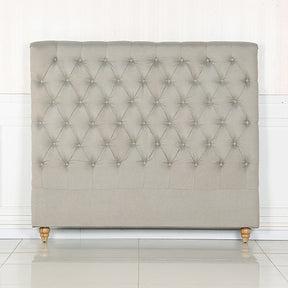 Khancoban beige French Provincial queen bed head with metallic studs in a bedroom