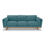 Marbella teal fabric sofa in a modern living room
