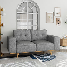 Competa grey fabric sofa in a modern living room