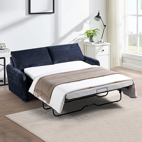 Deia blue fabric sofa bed in a modern living room