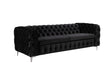 Salobrena black velvet sofa in a modern living room