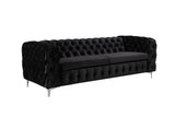 Salobrena black velvet sofa in a modern living room