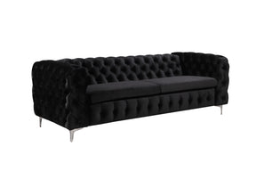 Salobrena black velvet sofa in a modern living room