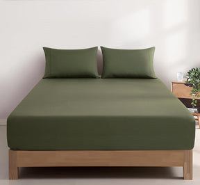 Montalcino sage vintage washed cotton fitted sheet combo set on a bed