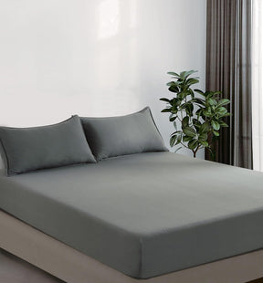 Volterra grey vintage washed microfibre fitted sheet set on a bed