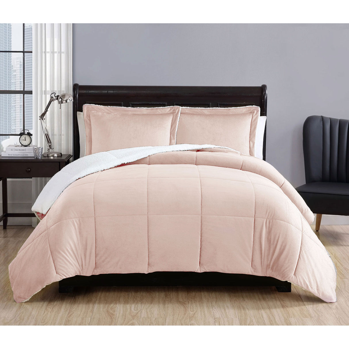Apricot micro mink comforter with quilted squares and two pillowcases on a Queen bed