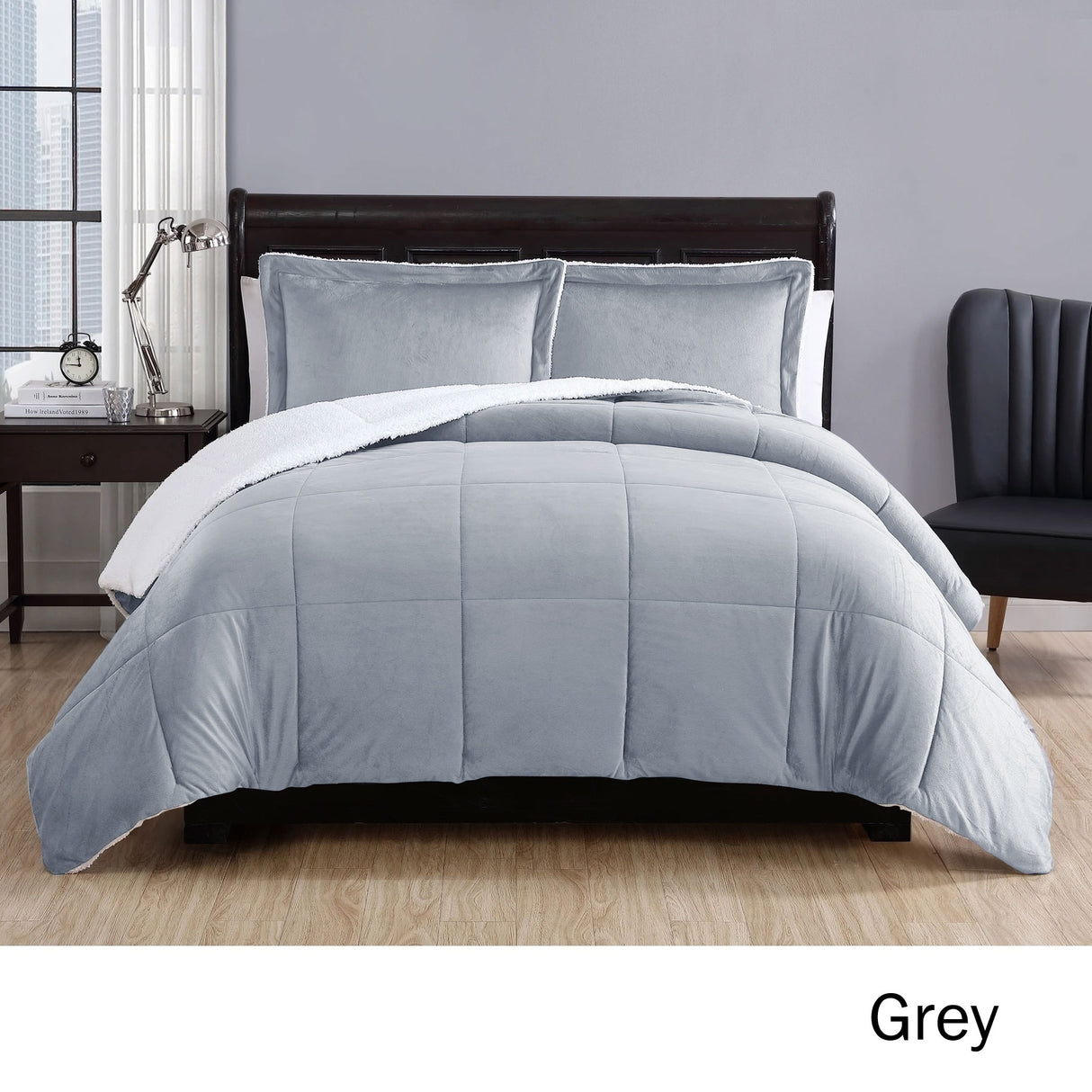 Grey micro mink comforter with quilted squares and two pillowcases on a Queen bed