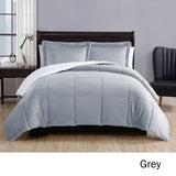 Grey micro mink comforter with quilted squares and two pillowcases on a Queen bed