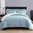 Foss Cross sky blue micro mink comforter with plush sherpa reverse on a Queen bed with pillowcases