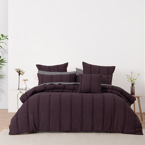Azay grape jacquard quilt cover set with vertical chenille stripes on a bed