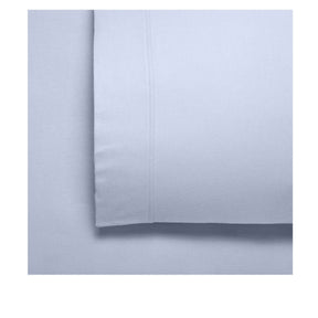 Deruta steel blue 170GSM flannelette cotton sheet set on a bed