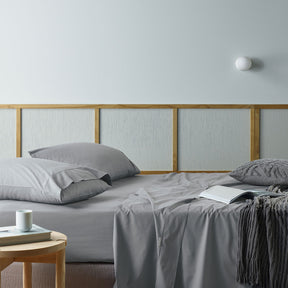 Bevagna silver recycled cotton and bamboo sheet set on a bed
