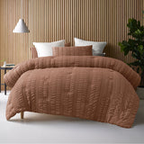 Compton Abdale tobacco seersucker comforter set on a Queen bed with two pillowcases