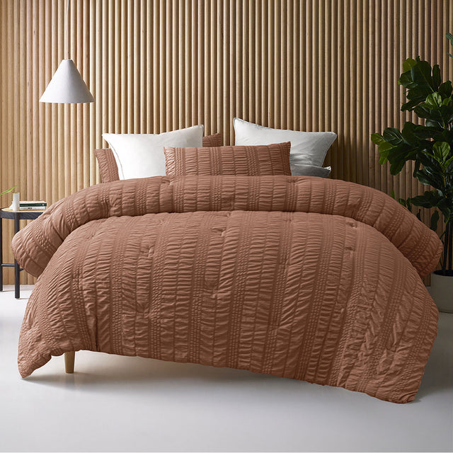 Compton Abdale tobacco seersucker comforter set on a Queen bed with two pillowcases