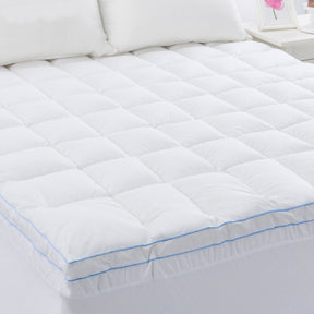 Abersoch 750GSM microball mattress topper king on a bed