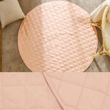Peach round quilted linen baby play mat, 130cm diameter