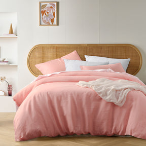 Chaumont peach French linen quilt cover set with vintage wash on a styled bed